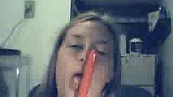 Horny slut plays on a webcam with her pussy