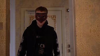 A strange guy in a mask lured into a cozy room