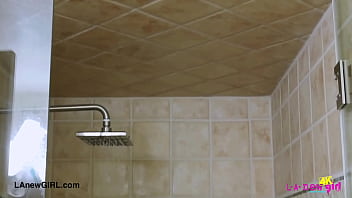 Fresh faced blonde model enjoys a sensual bath