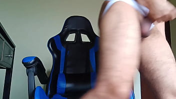 Young man with hat and jeans strips naked and cums very hot