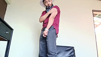 Young man with hat and jeans strips naked and cums very hot