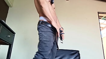 Young man with hat and jeans strips naked and cums very hot