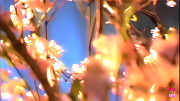 In a picturesque woodland an attractive woman with dark hair engages in intense sexual activity with a muscular man adorned with tattoos