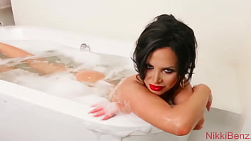 Nikki benz finger fucks herself during shower time in the jacuzzi