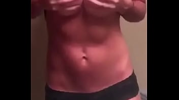 Blonde girl with big boobs flash in the bathoom