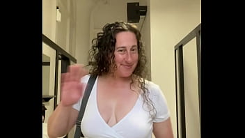 Curvy milf exposes big breasts in downtown