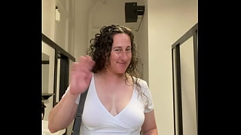Curvy milf exposes big breasts in downtown