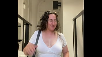 Curvy milf exposes big breasts in downtown