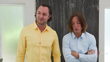 Bossy milf takes on two cocks to help cover up a corporate debacle