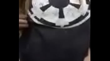 Busty burnette plays with her tits