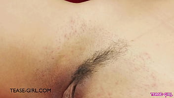 Enchanting brunette beauty naked close up