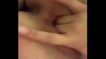Lonely girl fingering her pussy