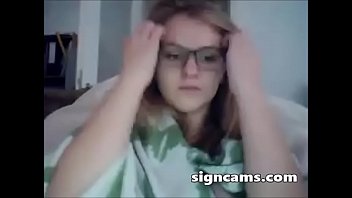 Blonde teen with glasses shows off on webcam