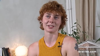 Redhead girl plays with her favorite toy