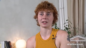 Redhead girl plays with her favorite toy