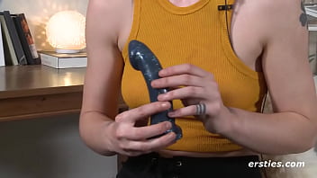 Redhead girl plays with her favorite toy