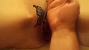 Filthy babe gets her tattooed pussy fisted