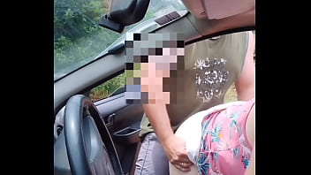 Naughty bia showing off on the street showing her pussy and breasts