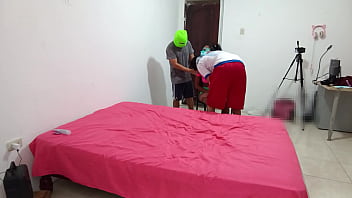 The indian woman flirts with two men while filming her porn scene and fucks with a skin colored dildo