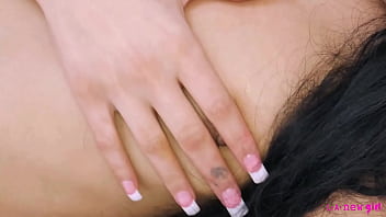 Captivating dark haired beauty naked close up