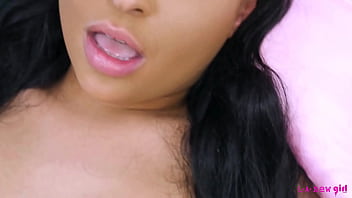 Captivating dark haired beauty naked close up