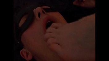 Fetish kept on a leash licks legs and feet of his mistress