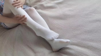 Footjob in white pantyhose
