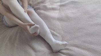 Footjob in white pantyhose
