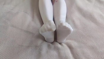 Footjob in white pantyhose