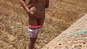 Nude girl enjoys in the fields