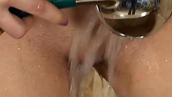 Brunette babe ina masturbates in the shower