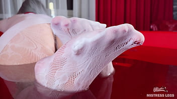 I sat on the edge of bath tub in cute white fishnets and stretch my legs to you face