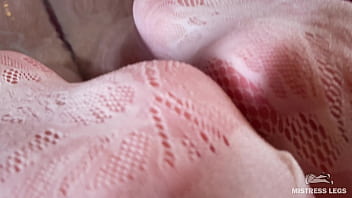 I sat on the edge of bath tub in cute white fishnets and stretch my legs to you face