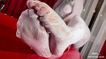 I sat on the edge of bath tub in cute white fishnets and stretch my legs to you face