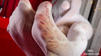 I sat on the edge of bath tub in cute white fishnets and stretch my legs to you face