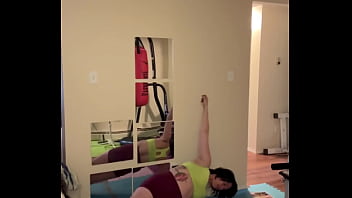 Sarah bj stretching in workout outfit