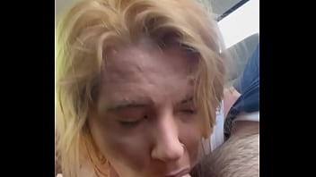 Young milf deepthroats cock in the backseat of a car during the middle of the day while her boyfriend is at work