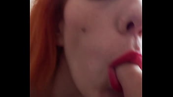 The redheaded cockslut karla rose in stockings knows her place—on her knees tongue glued to my balls until i’m done with her