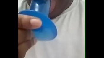 Black teen sucking dildo