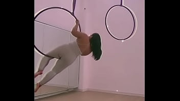 Pinay pole dancing with heels and doing aerial hoops