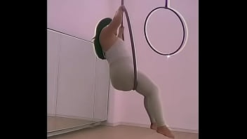 Pinay pole dancing with heels and doing aerial hoops