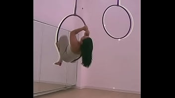 Pinay pole dancing with heels and doing aerial hoops