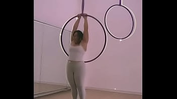 Pinay pole dancing with heels and doing aerial hoops