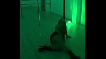 Pinay pole dancing with heels and doing aerial hoops