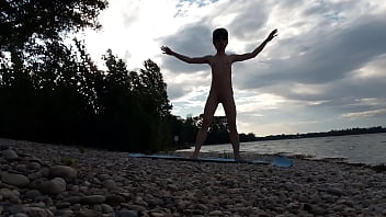 Skinny Naturist Twink Practices Naked Yoga On A Nudist Beach thumbnail