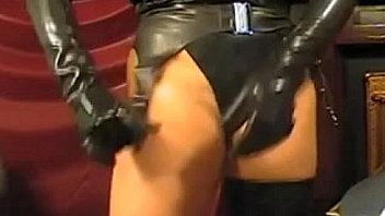 Girl in latex tight dress and mask on webcam