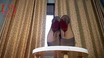 Nice lady in pantyhose and heels striptease at the round table 33