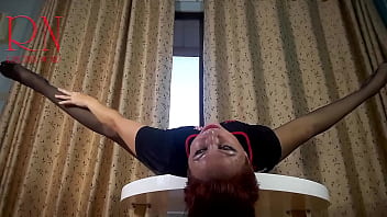 Nice lady in pantyhose and heels striptease at the round table 33