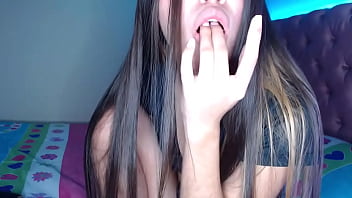 Petite teen strips and masturbates