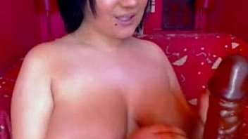 Sexy milf with huge tits teases and plays on webcam